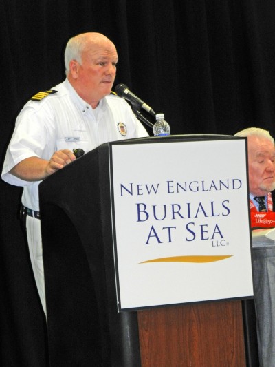 Captain Brad White speaks to a large audience at the AARP Boston Show